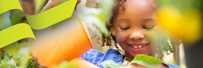 Girl watering plants