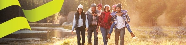 Family walking along a lake - Alectra Utilities desktop banner