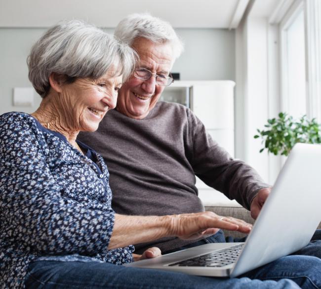 A couple using computer