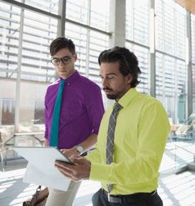 Two men looking at papers