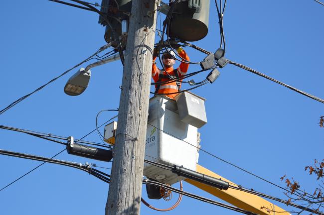 A man fixing the street light