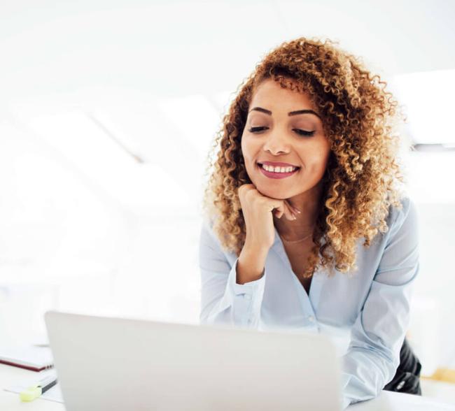 girl browsing on her laptop