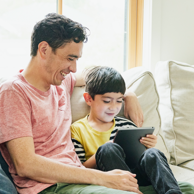 Dad and son reading