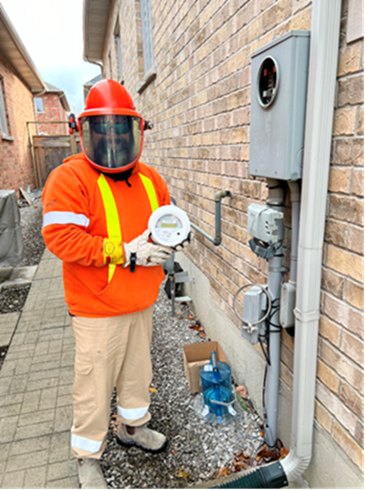 Technician working on meter